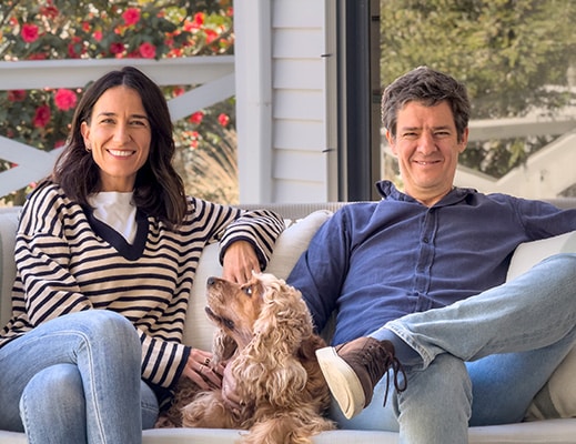 Happy couple relaxing on their porch