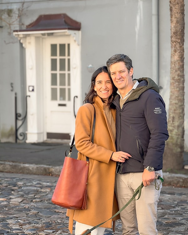Maria and Fernando, hopeful adoptive parents, smile on their walk