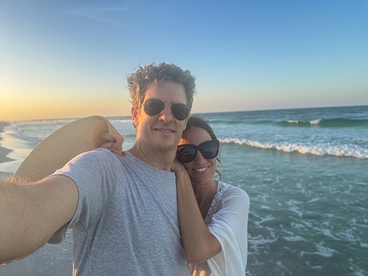 hopeful adoptive couple at the beach