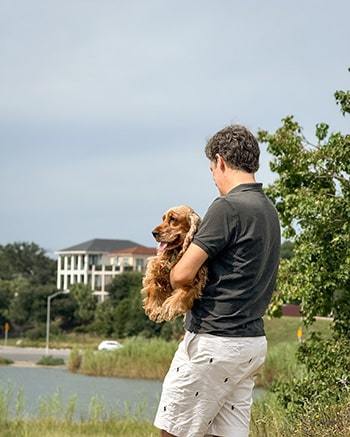 Fernando-holding-MollyDog