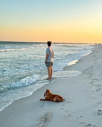 Fernando-with-dog-at-beach