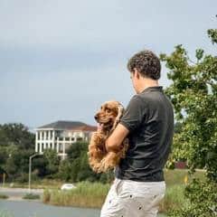 Fernando-holding-MollyDog